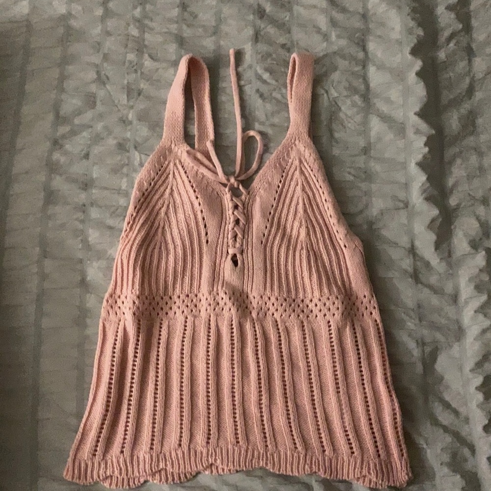 a knitted pink tank top